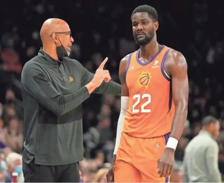  ?? RICK SCUTERI/USA TODAY SPORTS ?? Then-Phoenix Suns head coach Monty Williams talks to center Deandre Ayton in the first half against the New Orleans Pelicans at Footprint Center in Phoenix on Feb. 25, 2022.