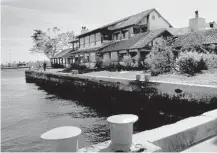  ?? SUN SENTINEL FILE ?? Burt &amp; Jack’s restaurant sat on a scenic spit of land at Port Everglades in Fort Lauderdale. It closed in 2002 and was torn down in 2006.