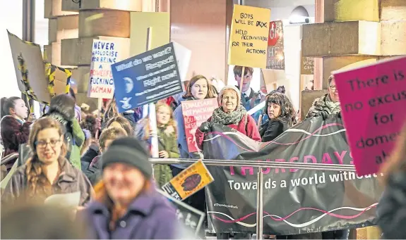  ?? Pictures: Kris Miller. ?? The group of protesters takes to the streets of Perth yesterday to show nobody should be afraid to walk around at night.