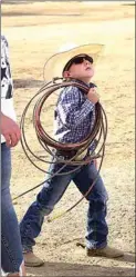  ?? NICK SMIRNOFF / FOR TEHACHAPI NEWS ?? Spurs, boots, belt buckle, shades and his rope, this young Junior Rodeo Cowboy is ready for the roping competitio­n.