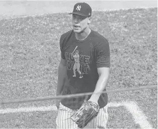  ?? KATHYWILLE­NS/AP ?? Yankees right fielder Aaron Judge, who is on the injured list, walks off the field after a brief workout in the outfield before the start of a game against the Orioles on Sunday at Yankee Stadium in NewYork.