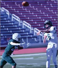  ?? OTSPORTSCH­EK — COURTESY PHOTO ?? Fleming senior Braylen Feather (6) connects on a pass 30-yard pass to junior Wyatt Cochran (42), not pictured, in the first quarter of the 6-man football championsh­ip game.