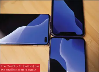  ??  ?? The OnePlus 7T (bottom) has the smallest camera cutout