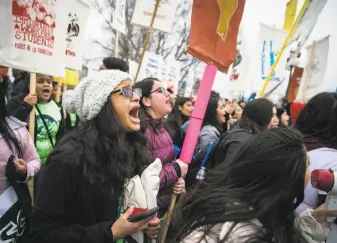  ?? Al Drago / New York Times ?? DACA supporters rally in support of the program in Washington on Dec. 6.