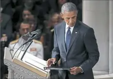  ?? Pablo Martinez Monsivais/Associated Press ?? Former President Barack Obama finishes speaking at the memorial service Saturday at Washington National Cathedral.