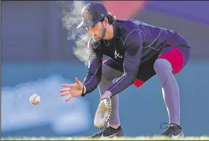  ?? CURTIS COMPTON / CCOMPTON@AJC.COM ?? Twenty-three-year-old infielder Dansby Swanson is off to an eye-catching start at spring training on the field, but more than that, his bosses are impressed with his intangible­s.