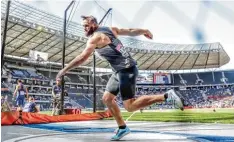  ?? Foto: Kai Nietfeld, dpa ?? Noch immer gut in Schwung. Der 33 jährige Robert Harting qualifizie­rte sich für das Finale im Diskuswurf heute Abend ab 20.20 Uhr.