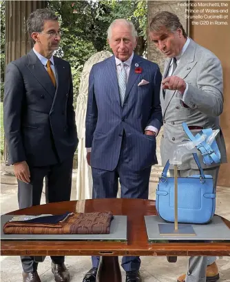  ?? ?? Federico Marchetti, the Prince of Wales and Brunello Cucinelli at
the G20 in Rome.