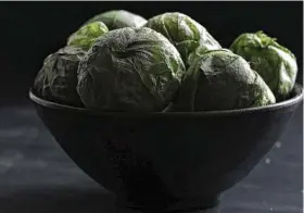  ?? E. Jason Wambsgans / Chicago Tribune ?? Tomatillos are inexpensiv­e, easy to use, tasty and good for you.