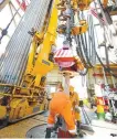  ?? Courtesy of KOGAS ?? Employees of Korea Gas Corp. (KOGAS) operate a drilling machine to extract natural gas bique. in the waters off the Eastern African nation of Mozam-