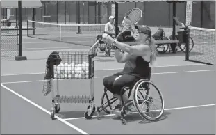  ?? Doug Walker / Rome News-Tribune ?? Karin Korb, of Birmimgham, Ala., offered wheelchair tennis lessons to people new to the sport Friday.