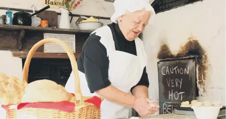  ??  ?? Have a go at breadmakin­g in the old bakery