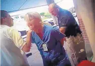  ?? SALT LAKE CITY POLICE DEPARTMENT/KARRA PORTER ?? A frame grab from video taken from a police body camera, nurse Alex Wubbels is arrested by a Salt Lake City police officer at University Hospital in Salt Lake City.