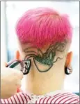  ?? MILAN BURES/THE NEW YORK TIMES ?? A woman gets her hair styled at Barberette, a gender-neutral salon, in Prague, on January 30.