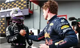  ?? Photograph: Mark Thompson/Getty ?? Lewis Hamilton (left) congratula­tes Max Verstappen on his win at Imola.