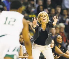  ?? Alonzo Adams / Associated Press ?? Baylor coach Kim Mulkey instructs her team against Iowa State during the first half in the Big 12 tournament championsh­ip in Oklahoma City on March 11.