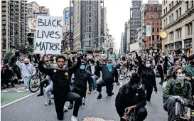  ?? ?? PROTESTERS in New York rally against the death in Minneapoli­s police custody of George Floyd in
2020. These protests and the successes of the Black Lives Matter movement were commended as rare examples of truly free expression in the US. | JEENAH MOON Reuters