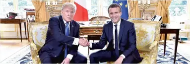  ??  ?? Le président américain Donald Trump et son homologue français Emmanuel Macron.