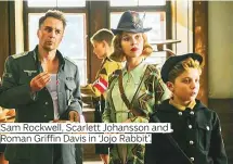  ??  ?? Sam Rockwell, Scarlett Johansson and Roman Griffin Davis in ‘Jojo Rabbit’.