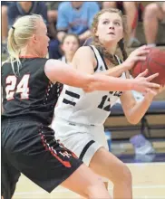  ??  ?? Gordon Lee freshman Emma Phillips looks to shoot against LaFayette freshman Haven Yancy during last Tuesday’s nailbiter, won by the Lady Ramblers, 51-49.