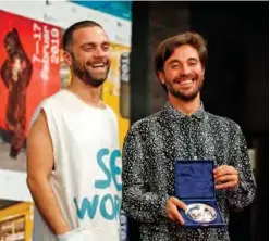  ??  ?? Director Manuel Abramovich (right) and Bogdan Georgescu give a press conference after receiving the Silver Bear jury prize in the short film category for the movie “Blue Boy”.