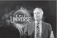  ?? Ricardo Ramirez Buxeda / Associated Press ?? Universal Parks & Resorts CEO Tom Williams announces a major expansion in Orlando.