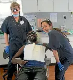  ?? SUPPLIED ?? Nelson dentist Karen Doouss, left, and her team pulled out more than 300 teeth during the eight days they were in Vanuatu.