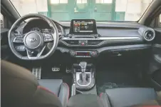  ??  ?? The 2020 Kia Forte5 has black and red colouring throughout the cabin.