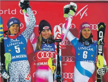  ??  ?? From left: Slovakia’s Veronika Velez Zuzulova (second placed), the winner Mikaela Shiffrin, of the United States, and third placed Wendy Holdener of Switzerlan­d Photo: AP