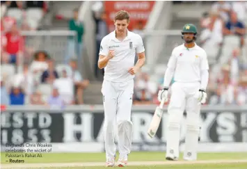  ?? — Reuters ?? England’s Chris Woakes celebrates the wicket of Pakistan’s Rahat Ali.