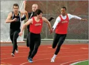  ?? DIGITAL FIRST MEDIA FILE PHOTO ?? Souderton anchor Austin Miller takes the baton from Shamar Jenkins and Christophe­r Dock anchor Cole Rupert takes it from Austin Kratz in the boys 4x 100 Mar. 21, 2016 at Christophe­r Dock.