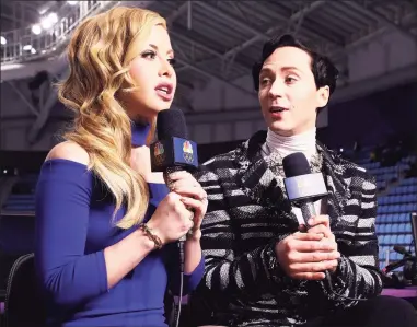  ?? Jamie Squire / Getty Images ?? Figure skating announcers Tara Lipinski and Johnny Weir prepare for the start of the pairs figure skating short program in the 2018 Winter Olympics at Gangneung Ice Arena on Feb. 14, 2018, in Gangneung, South Korea. For the 2022 Olympics in Beijing, they are working out of the NBC Sports offices in Stamford.