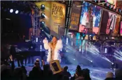  ??  ?? American singer, songwriter, Mariah Carey performs during New Year’s Eve celebratio­ns in Times Square in New York. — AFP photos