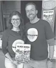  ?? MIKE MURPHY/CANANDAIGU­A DAILY MESSENGER ?? Shaunna and John Stith visited schools in Canandaigu­a and Gorham, where Shaunna attended, to read their children’s book with an environmen­tal message, “Black Beach.”