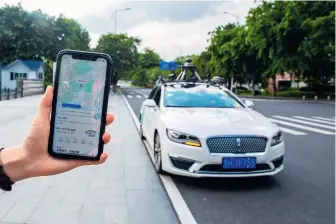  ??  ?? 2020 年 6 月 23 日，广州首批 20 辆自动驾驶网约车正式­投入运营