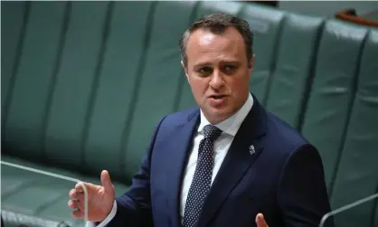  ?? ‘backslidin­g’. Photograph: Mick Tsikas/AAP ?? Speaking to the ABC, Tim Wilson defended the Morrison government’s record on net zero policies and criticised China and the UK’s