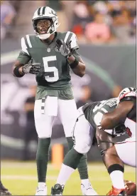  ?? Elsa / Getty Images ?? Jets quarterbac­k Teddy Bridgewate­r calls out the play in the first half against the Atlanta Falcons during a preseason game at MetLife Stadium on Friday.
