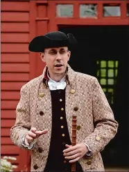  ?? DANA JENSEN/THE DAY ?? Docent Dayne Rugh talks about the saving of the Leffingwel­l House during the Norwich Founders’ Day event Saturday at the museum in Norwich.