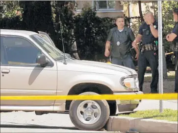  ?? Al Seib Los Angeles Times ?? A GUN was found at the scene in Reseda, but it was unclear whether the suspect fired any rounds at officers.