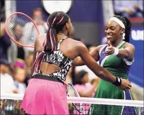  ?? John Minchillo / Associated Press ?? Sloane Stephens, right, is congratula­ted by Coco Gauff after Stephens won their match during the second round of the US Open on Wednesday.