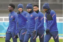  ?? Rui Vieira / Associated Press ?? England’s Bukayo Saka, Jadon Sancho, Ben Chilwell, Reece James and Marcus Rashford have helped inspire England fans.