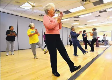  ?? RICHARD PIPES/JOURNAL ?? A 2018 American Heart Associatio­n study of 61 healthy, but inactive, adults ages 45 to 64 found that participan­ts who started exercise were able to reverse the cardiac effects of sedentary aging.