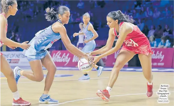  ?? Picture: NWC2019 ?? Action from the FijiSingap­ore clash.