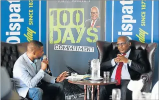  ?? Picture: ALAN EASON ?? TAKING STOCK: Daily Dispatch Editor Sibusiso Ngalwa asks BCM executive mayor Xola Pakati questions during Pakati’s 100 Days in Office breakfast held at the East London Golf Club yesterday