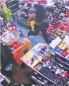  ??  ?? CCTV captures the robbery.