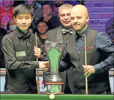 ?? ?? Young potters Zhao Xintong and Luca Brecel fought out the UK Championsh­ip