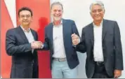  ?? PTI ?? From left: Sandeep Kataria, director, commercial, Vodafone India; Reed Hastings, cofounder and CEO, Netflix, and Himanshu Patil, COO, Videocon d2h Ltd, in New Delhi on Monday