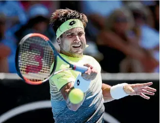  ?? ANTHONY AU-YEUNG/GETTY IMAGES ?? David Ferrer showed all of experience in seeing off the tough challenge of Wu Yibling.