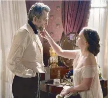  ??  ?? Daniel with Sally Field as First Lady Mary Todd Lincoln in a scene from the movie