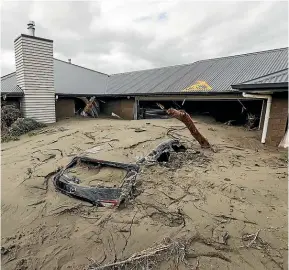  ?? ?? Extreme flooding damage can be seen in Hawke’s Bay on Thursday after Cyclone Gabrielle swept through.